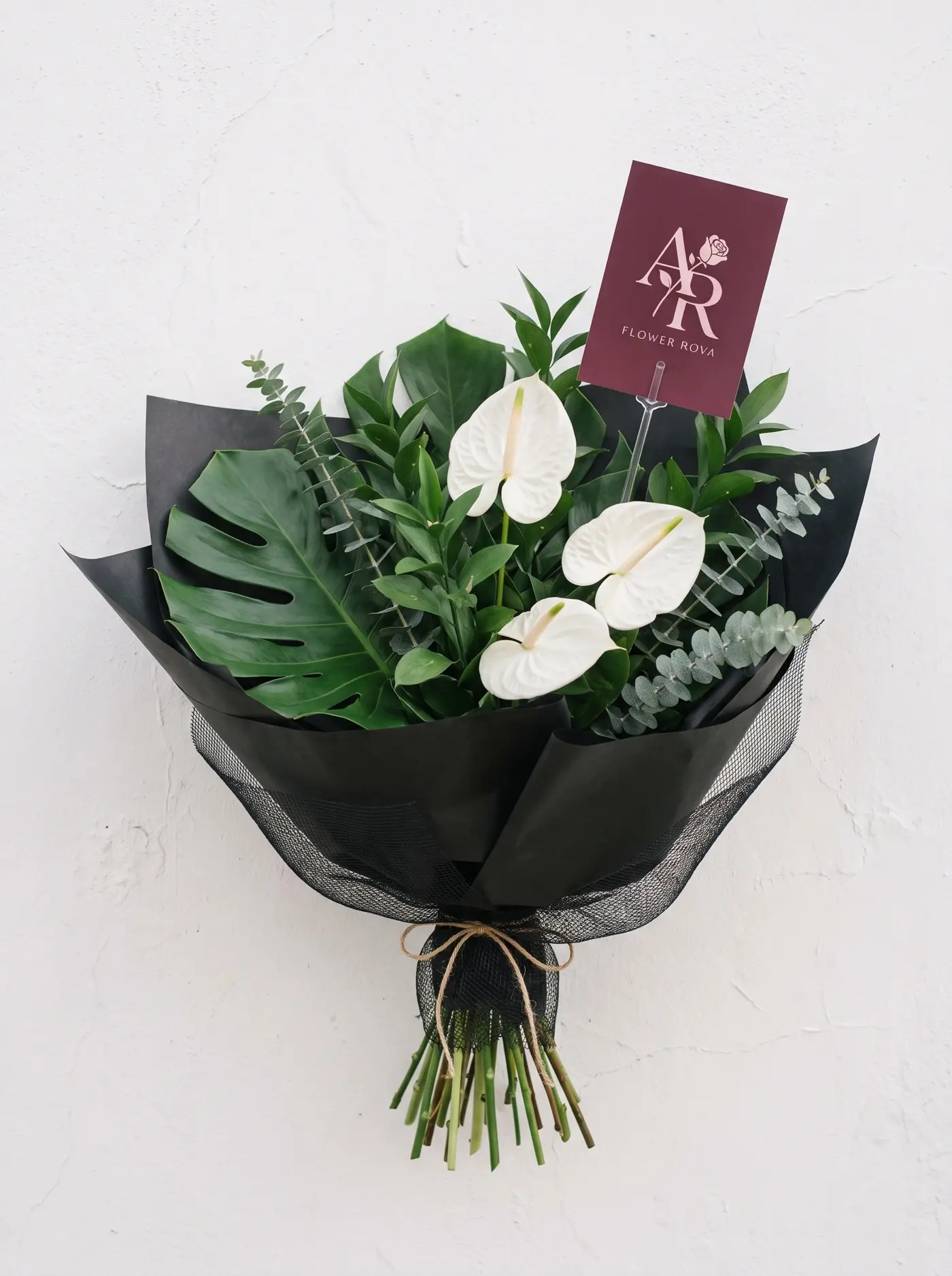 The Green Room — Foliage with white anthurium