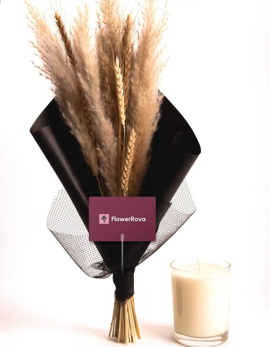 Dried pampas and wheat beside a scented candle, product visualisation
