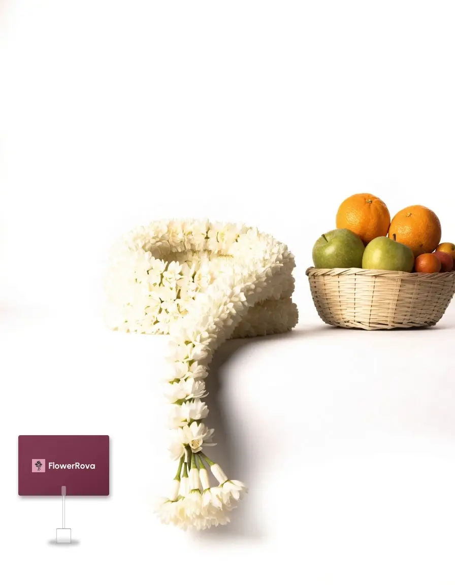 Jasmine garland beside a fruit basket, product visualisation
