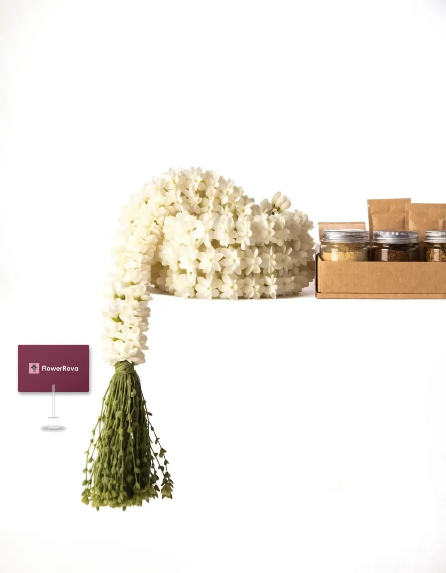 Jasmine garland beside a charcuterie and cheese box, product visualisation