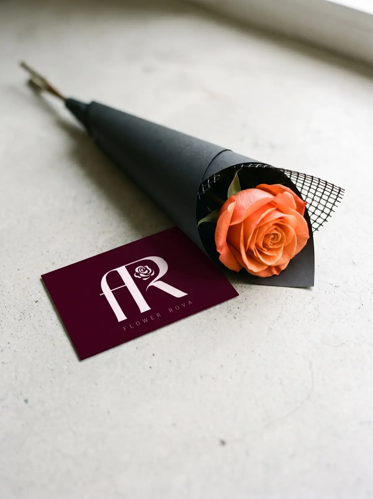 1 Orange Rose hand-tied in FlowerRova's black atelier wrap, Bangkok