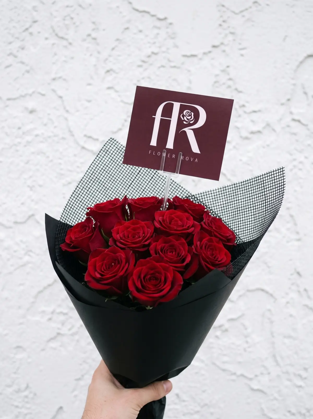 10 Red Roses hand-tied in FlowerRova's black atelier wrap, Bangkok
