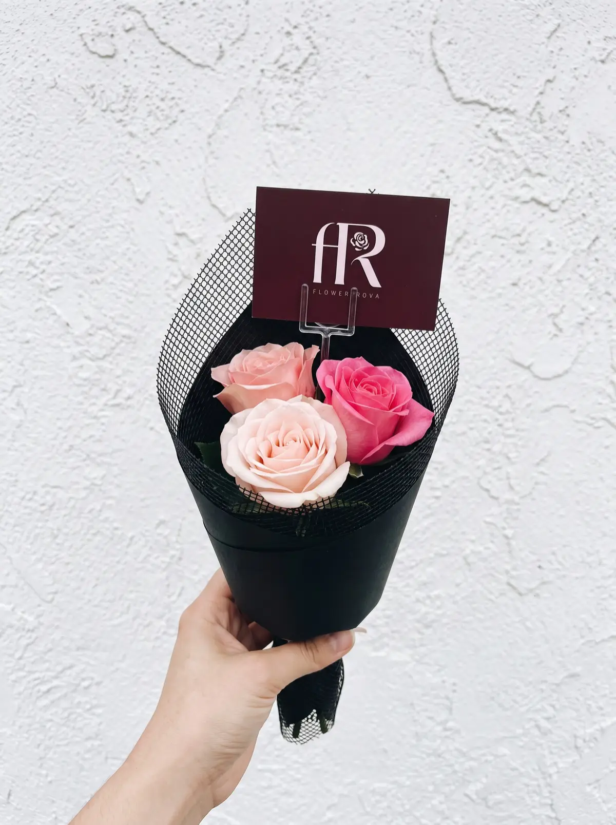 3 Pink Roses hand-tied in FlowerRova's black atelier wrap, Bangkok