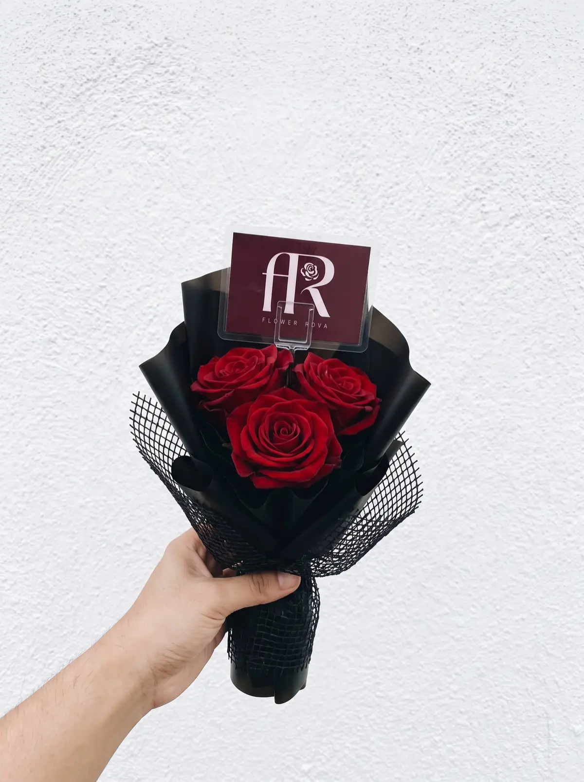 3 Red Roses hand-tied in FlowerRova's black atelier wrap, Bangkok