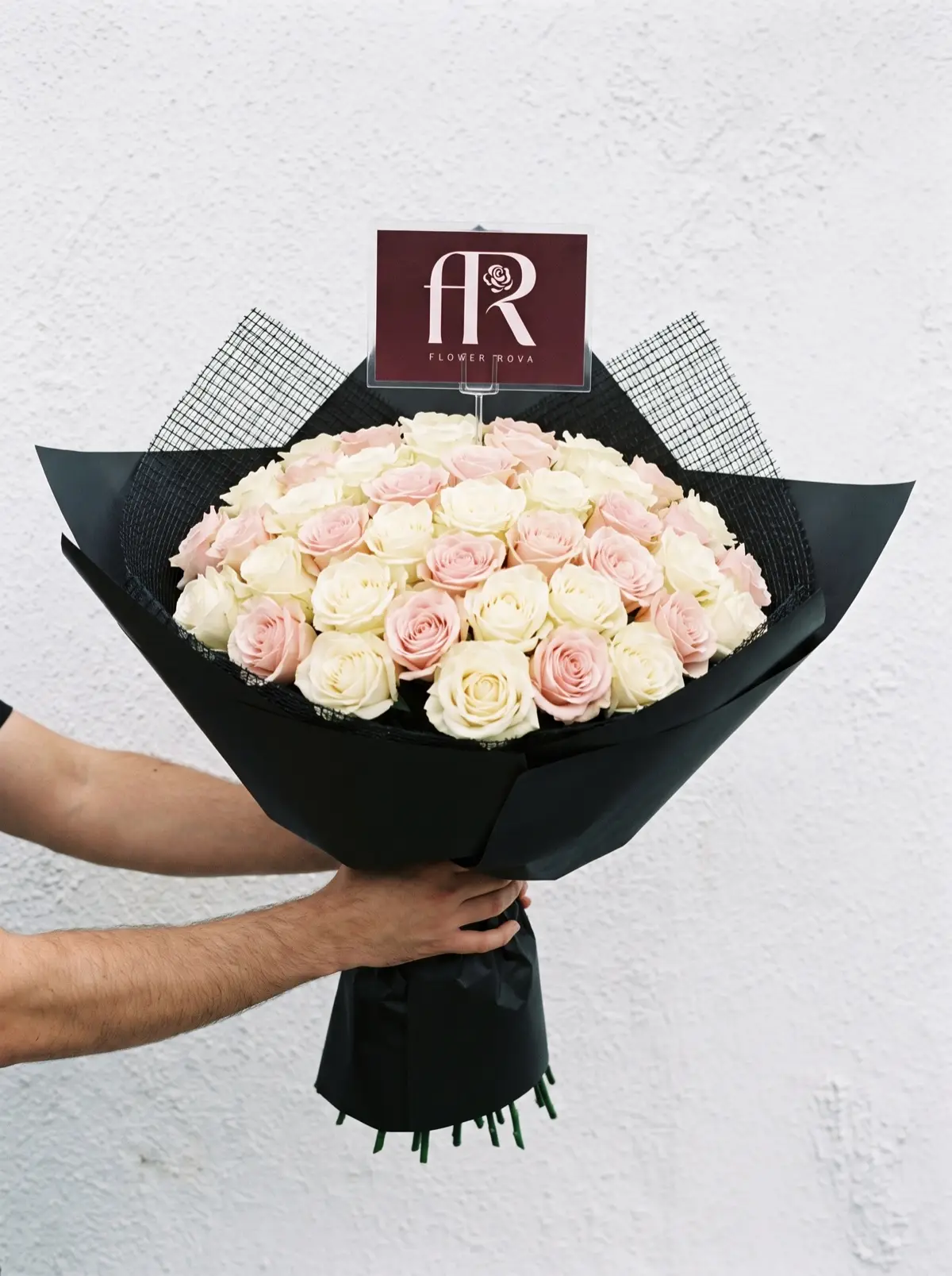 40 White + Pink Roses hand-tied in FlowerRova's black atelier wrap, Bangkok