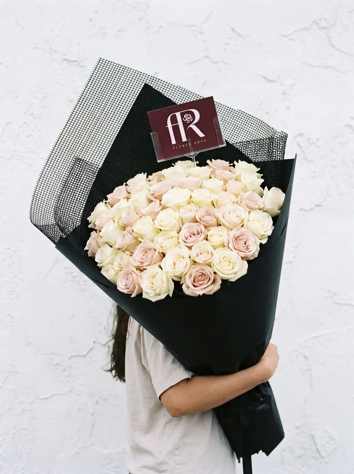 50 White + Pink Roses from FlowerRova