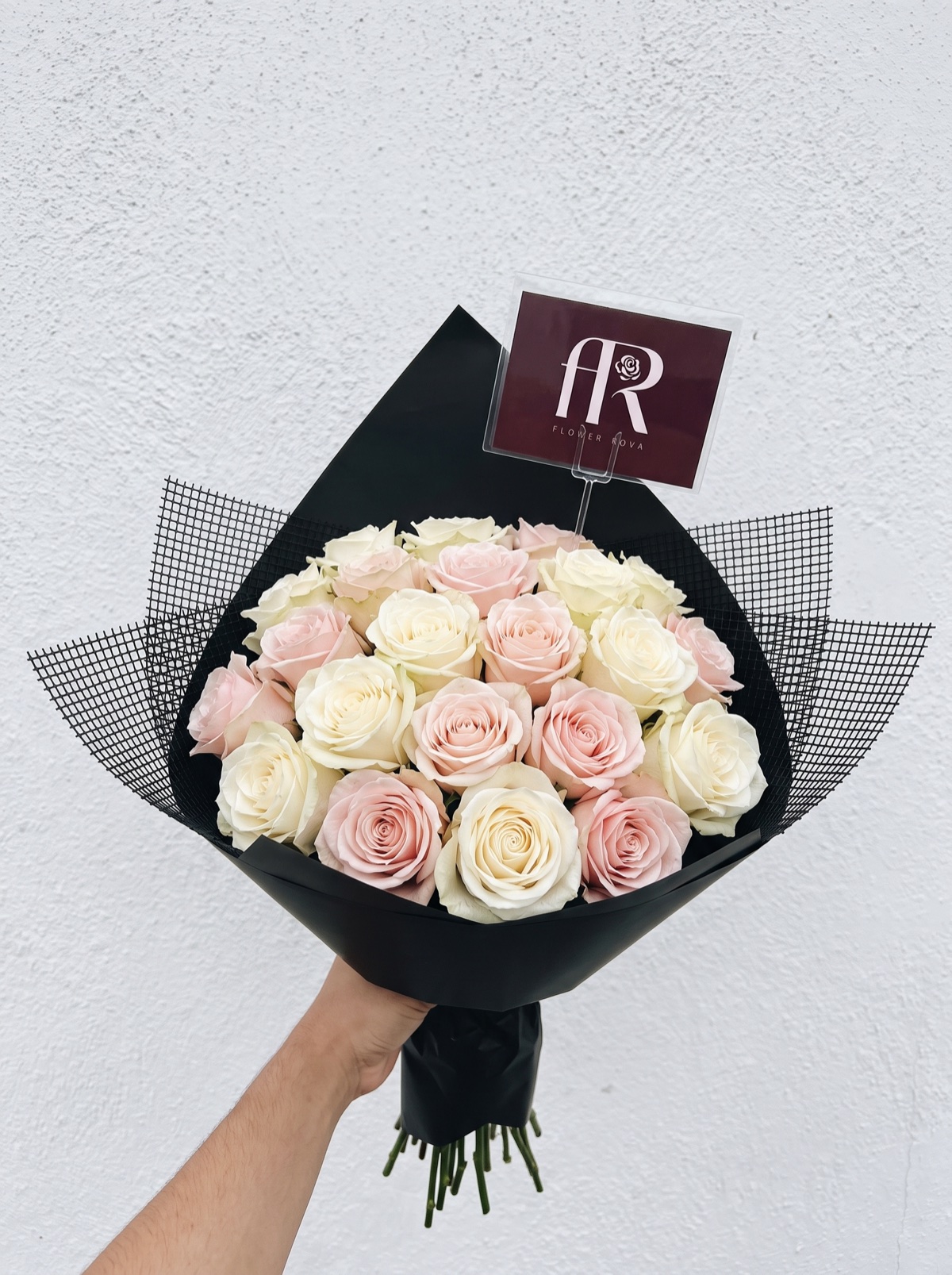 20 White + Pink Roses hand-tied in FlowerRova's black atelier wrap, Bangkok