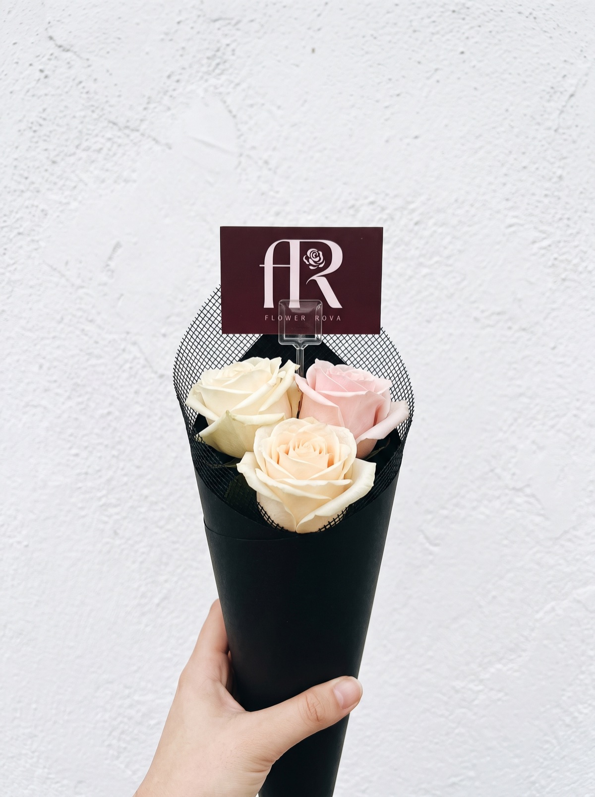 3 White + Pink Roses hand-tied in FlowerRova's black atelier wrap, Bangkok