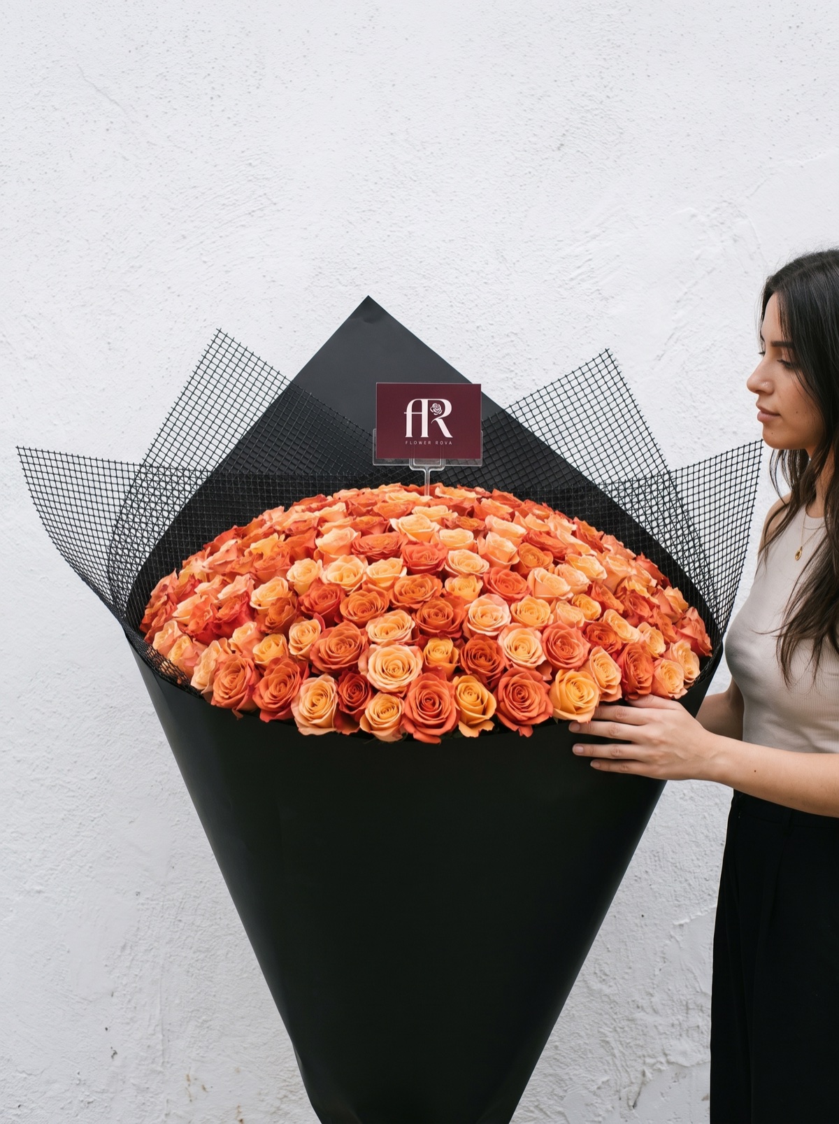 300 Orange Roses hand-tied in FlowerRova's black atelier wrap, Bangkok