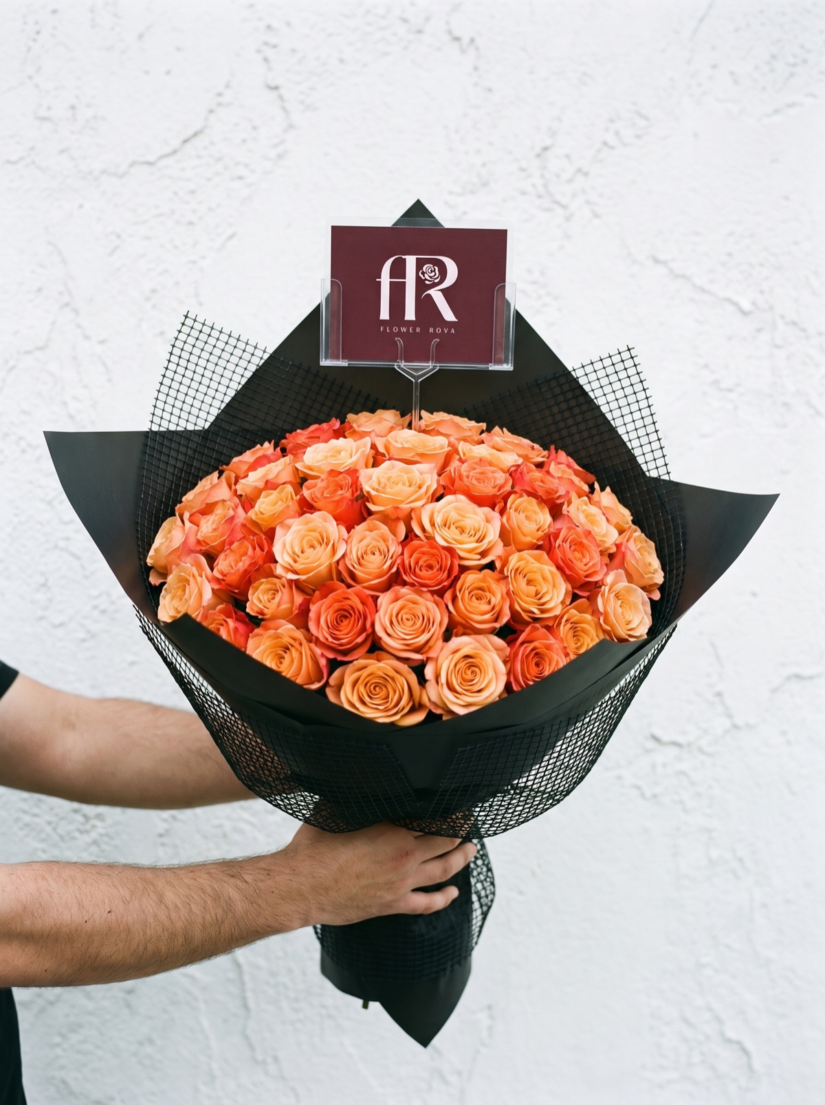 40 Orange Roses hand-tied in FlowerRova's black atelier wrap, Bangkok