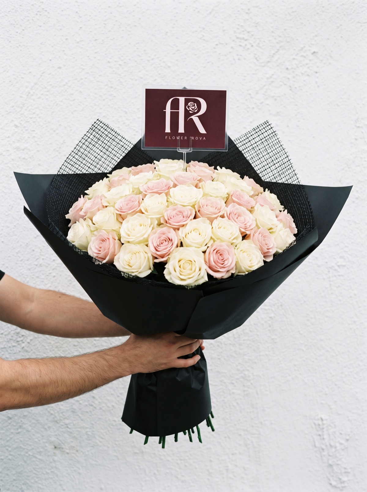 40 White + Pink Roses hand-tied in FlowerRova's black atelier wrap, Bangkok
